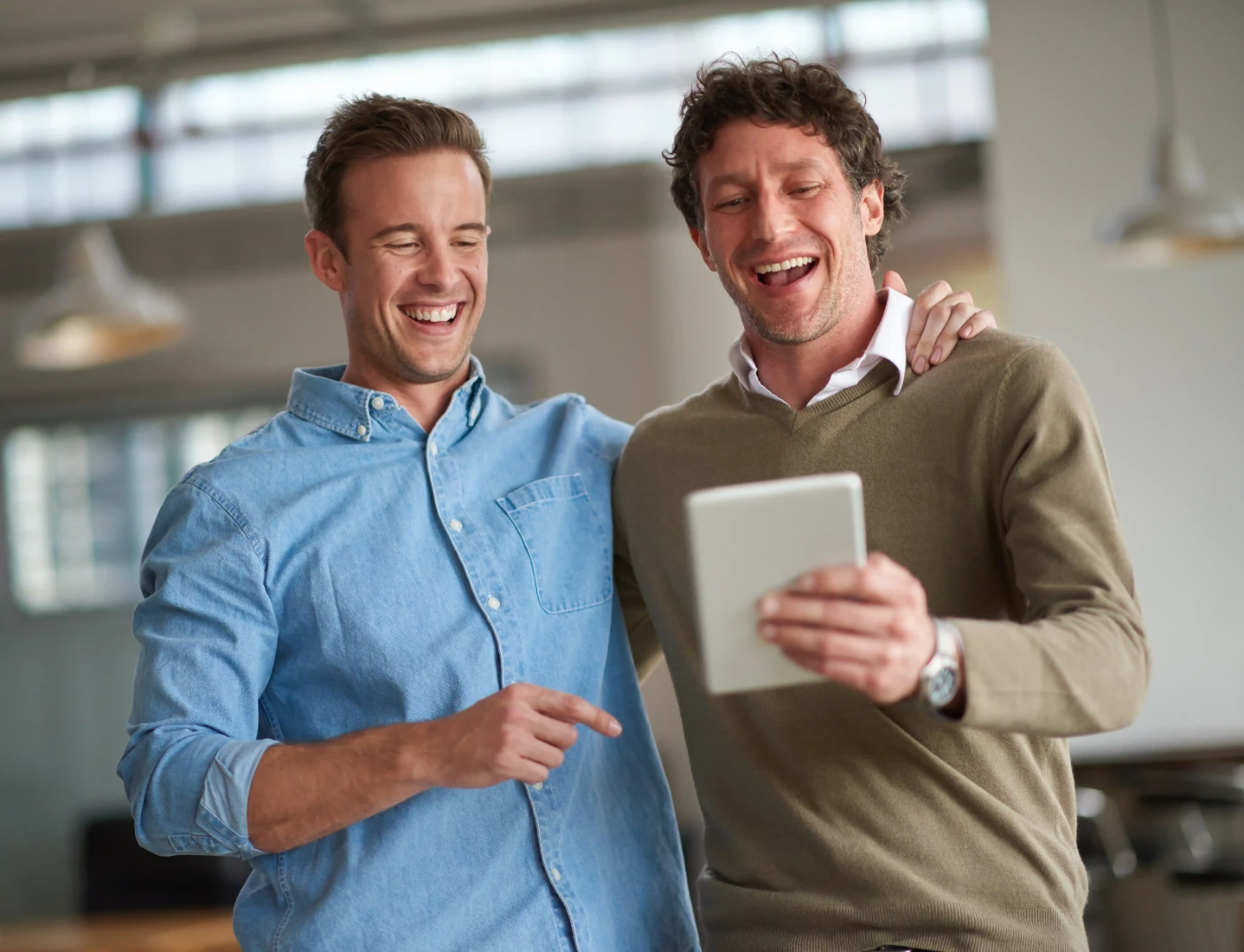 Team reviewing campaign performance on a tablet